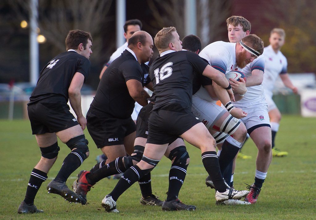 england deaf rugby player taking tackle in match