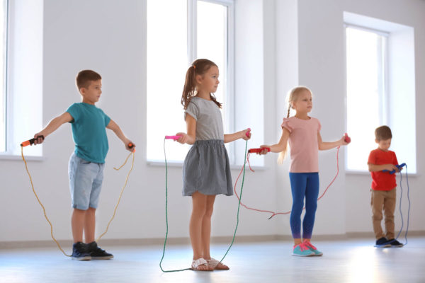 adorable-children-skipping-rope-indoors-uk-deaf-sport